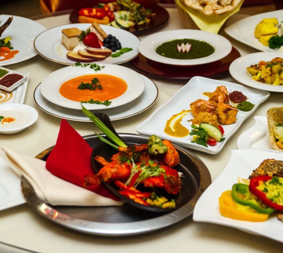 A spread of dishes laid out for a catering order